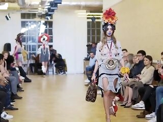 model leave behind to wear subjugation in fashion show