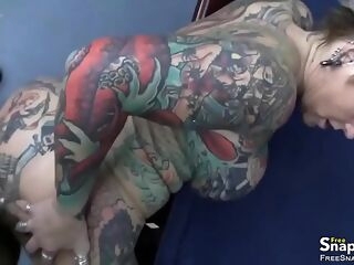 Tattooed Mature Slut Fucking Stiff